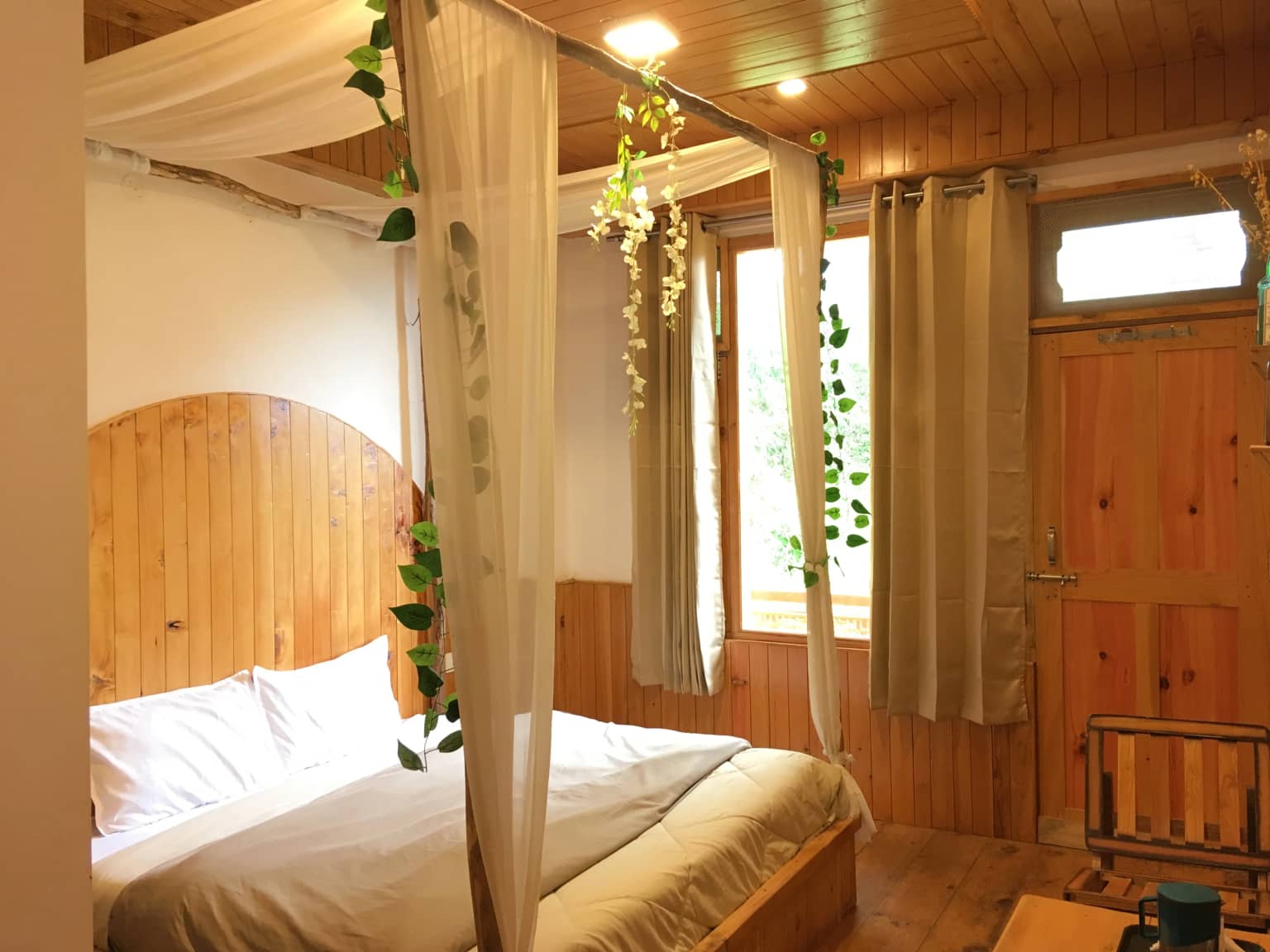 Cozy Canopy Room with Private Balcony - Main Image